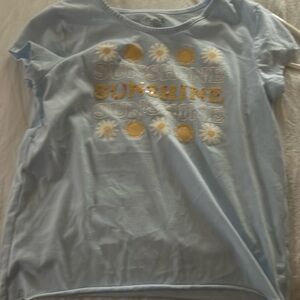 A cute shirt from the children’s place size is a Large